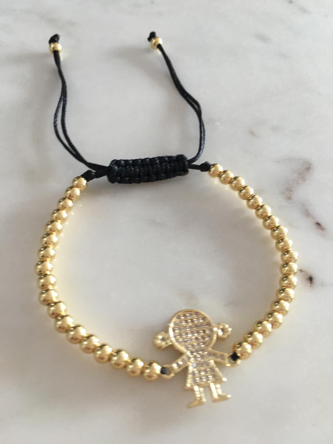 Harper gold bead girl zircon charm