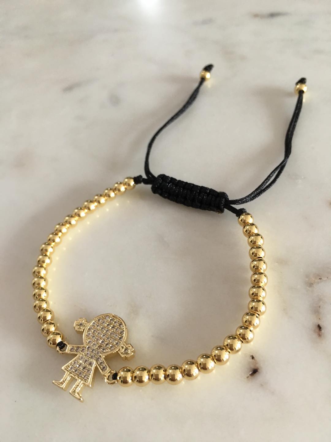 Harper gold bead girl zircon charm