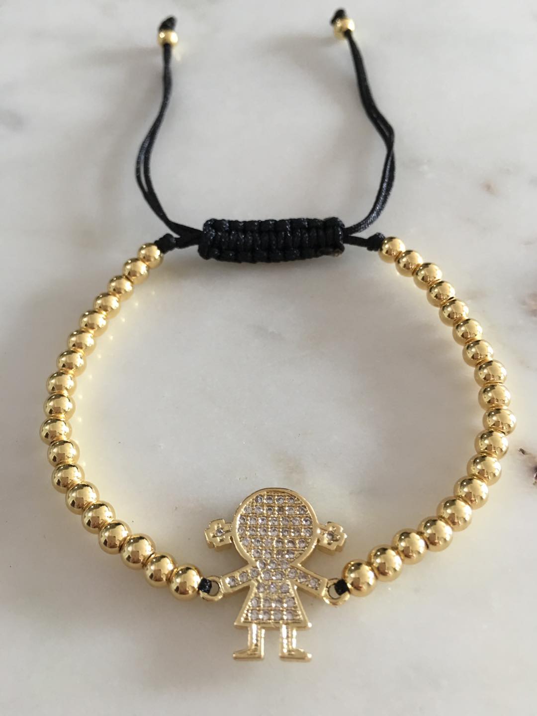 Harper gold bead girl zircon charm