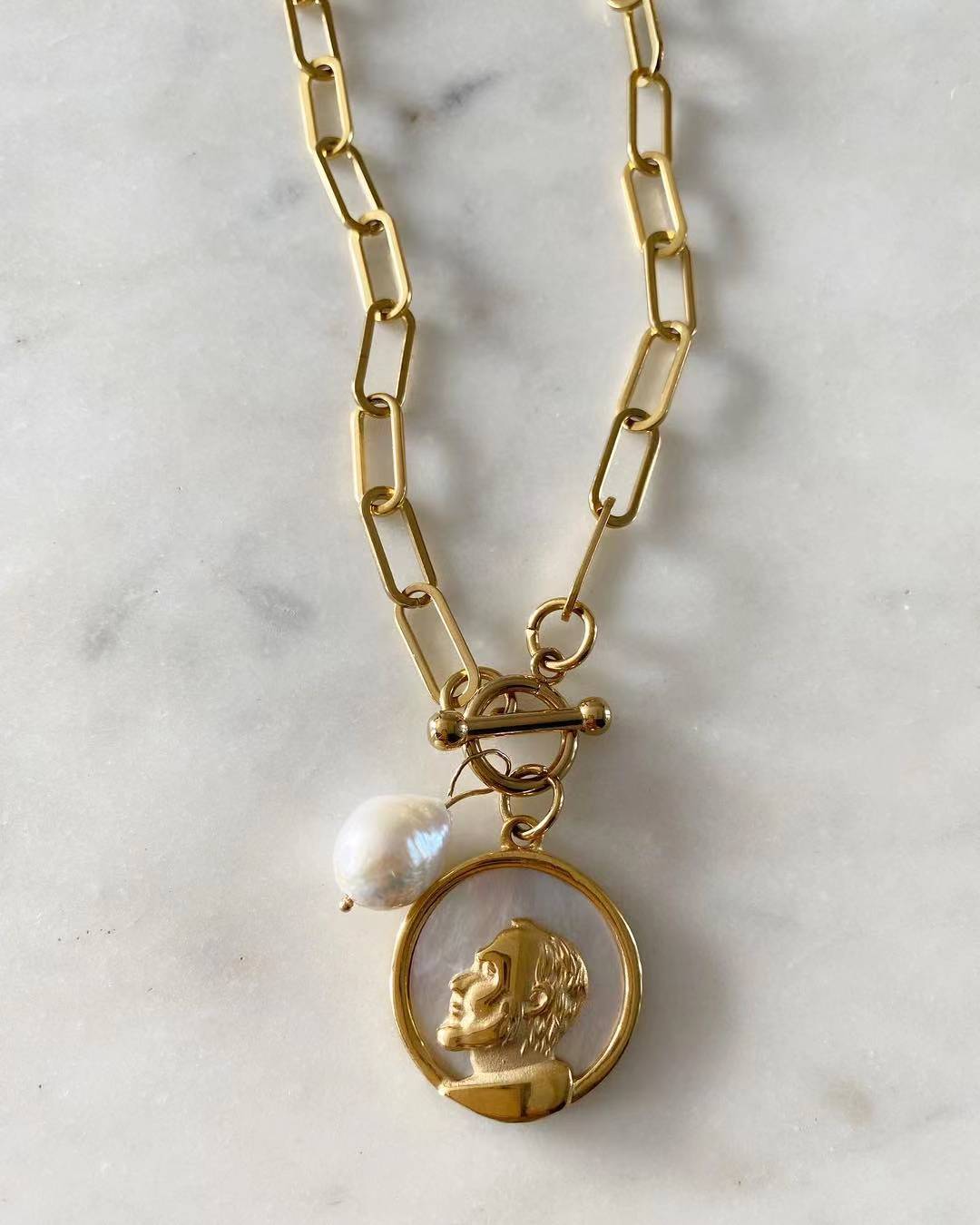St. Pio Toggle Lock with Pearl Necklace