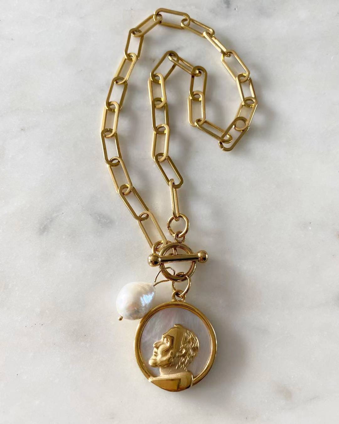 St. Pio Toggle Lock with Pearl Necklace