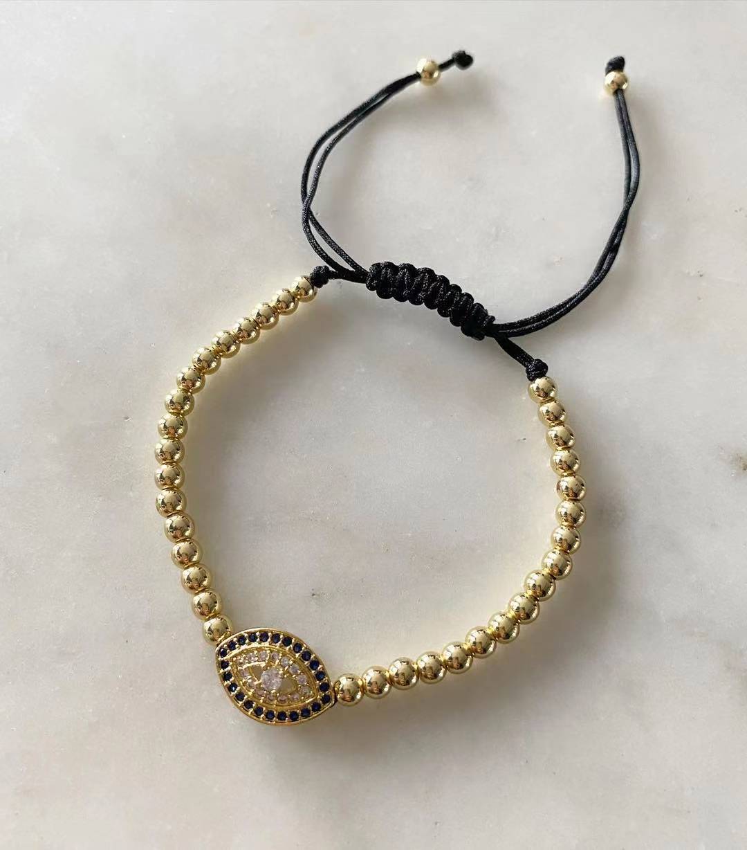 Harper gold bead Evil Eye with Blue Sapphire