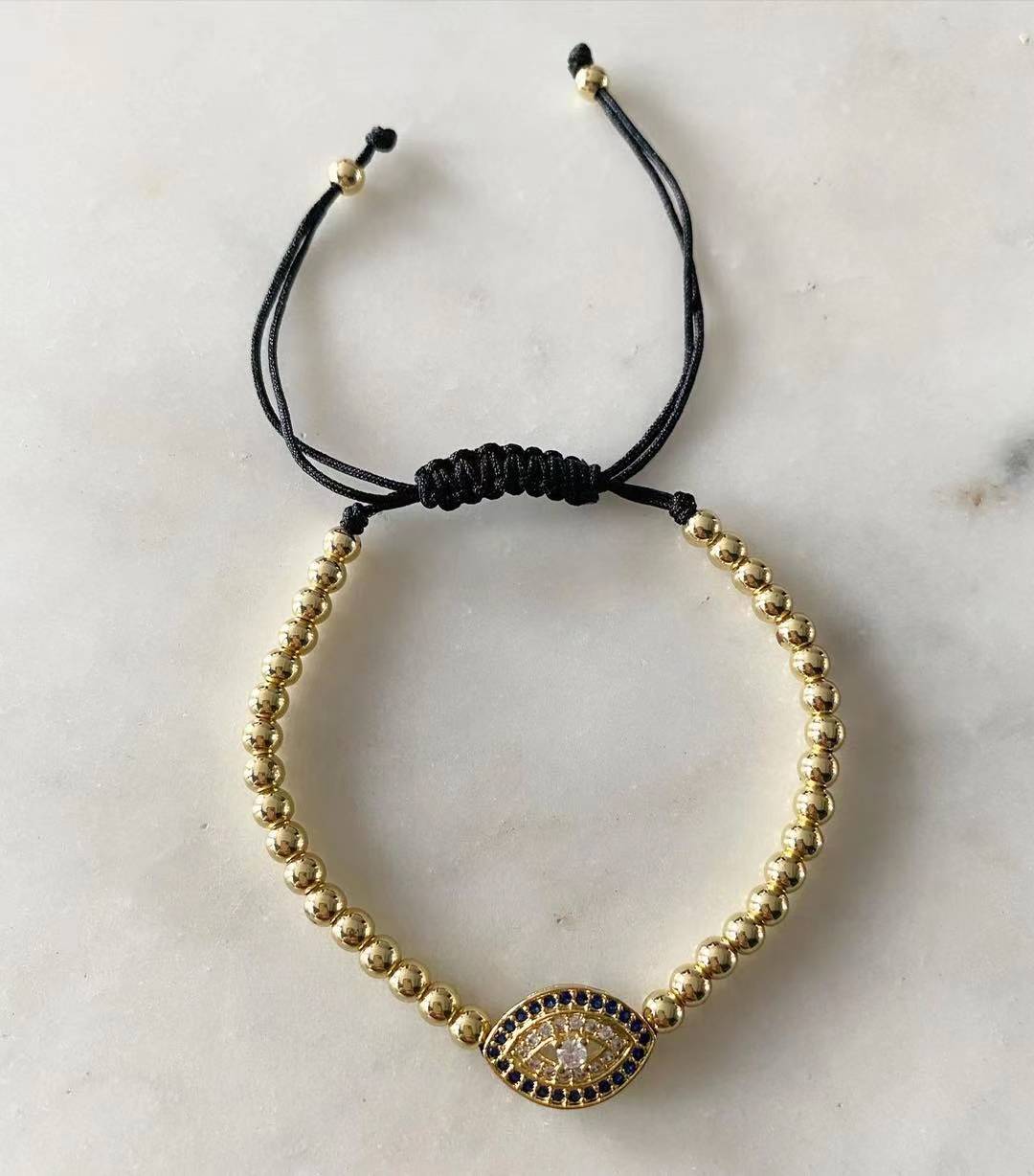 Harper gold bead Evil Eye with Blue Sapphire