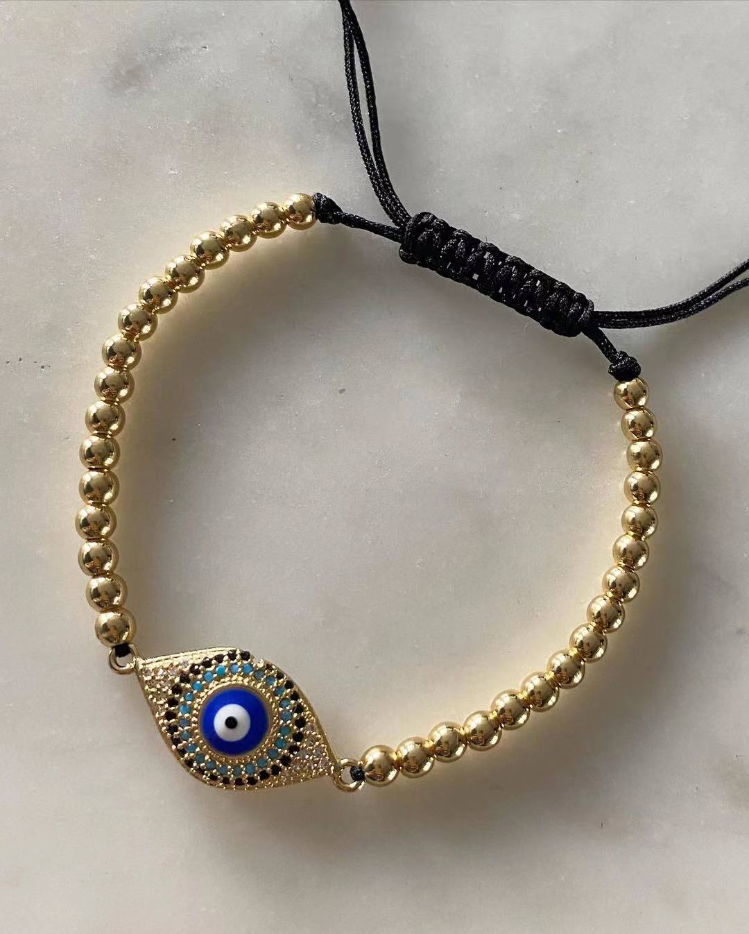 Harper gold bead Blue Evil Eye Charm
