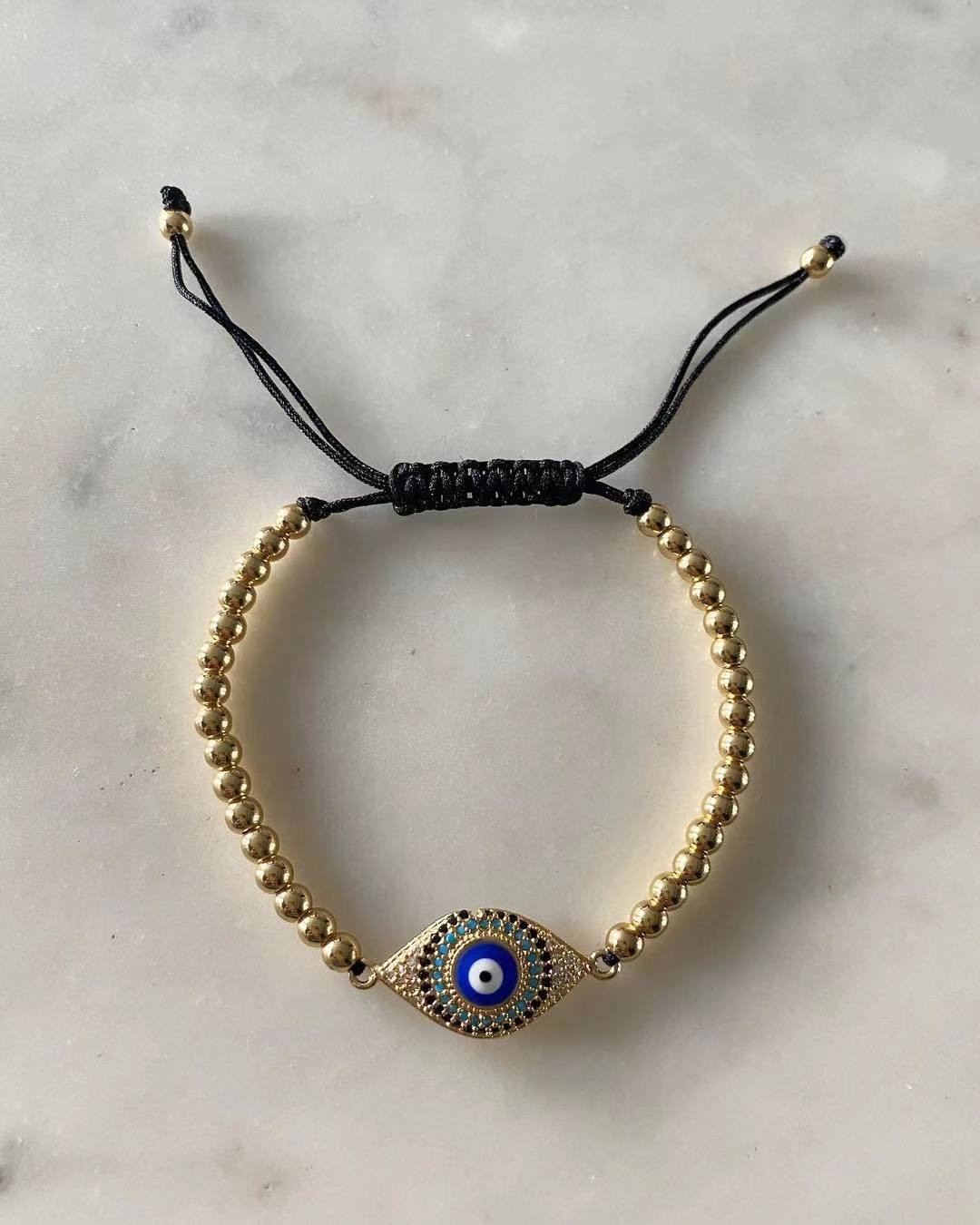 Harper gold bead Blue Evil Eye Charm