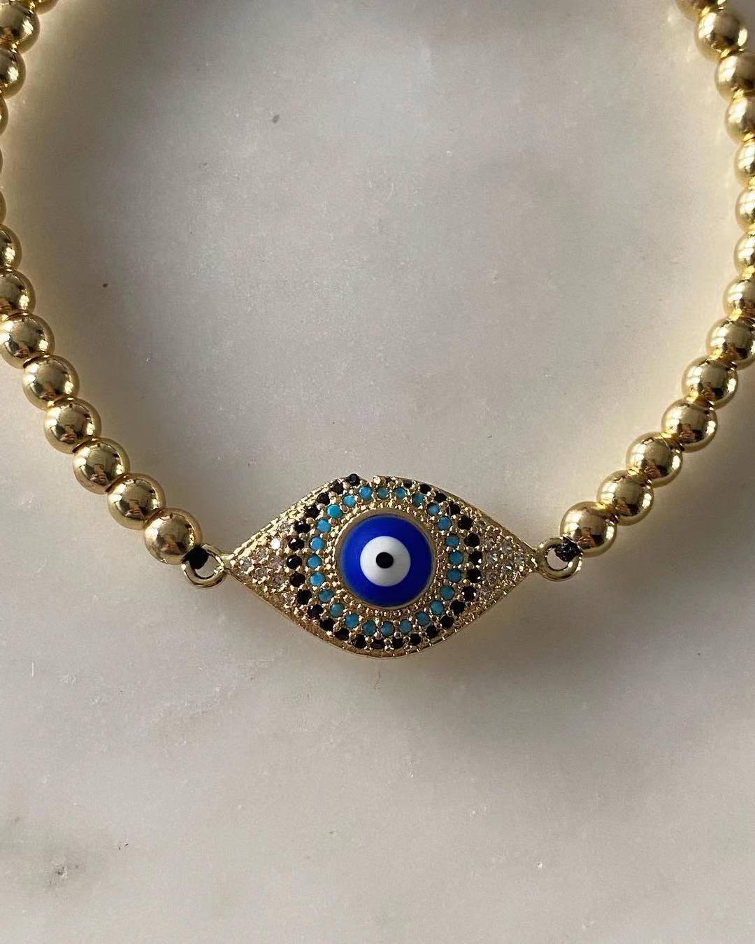 Harper gold bead Blue Evil Eye Charm