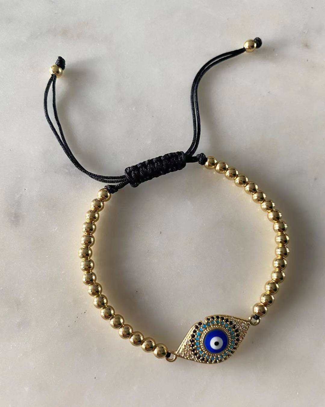 Harper gold bead Blue Evil Eye Charm
