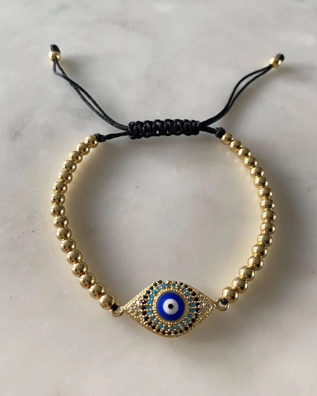 Harper gold bead Blue Evil Eye Charm