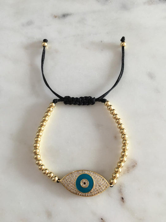 Harper gold bead evil eye charm