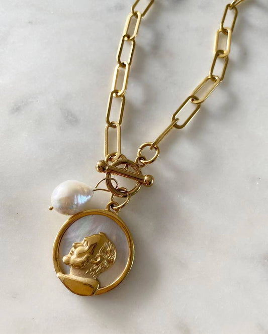 St. Pio Toggle Lock with Pearl Necklace