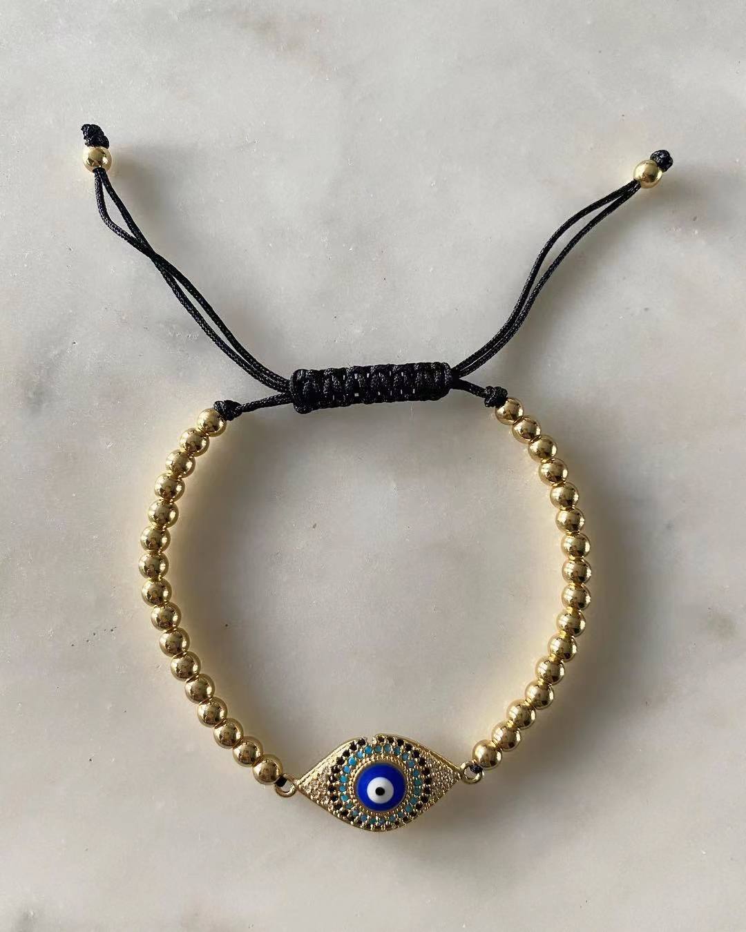 Harper gold bead Blue Evil Eye Charm