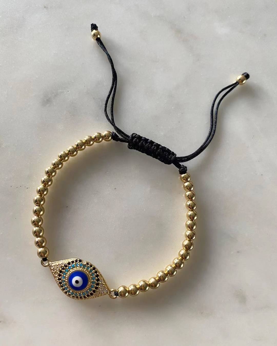 Harper gold bead Blue Evil Eye Charm